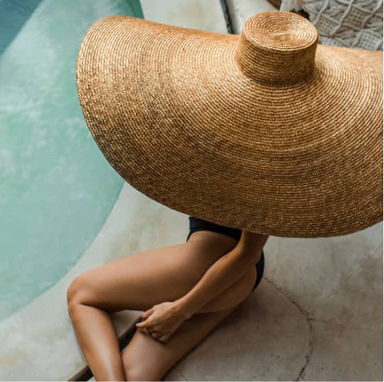 Woman Wearing Large Sunhat Woman Wearing Large Sunhat